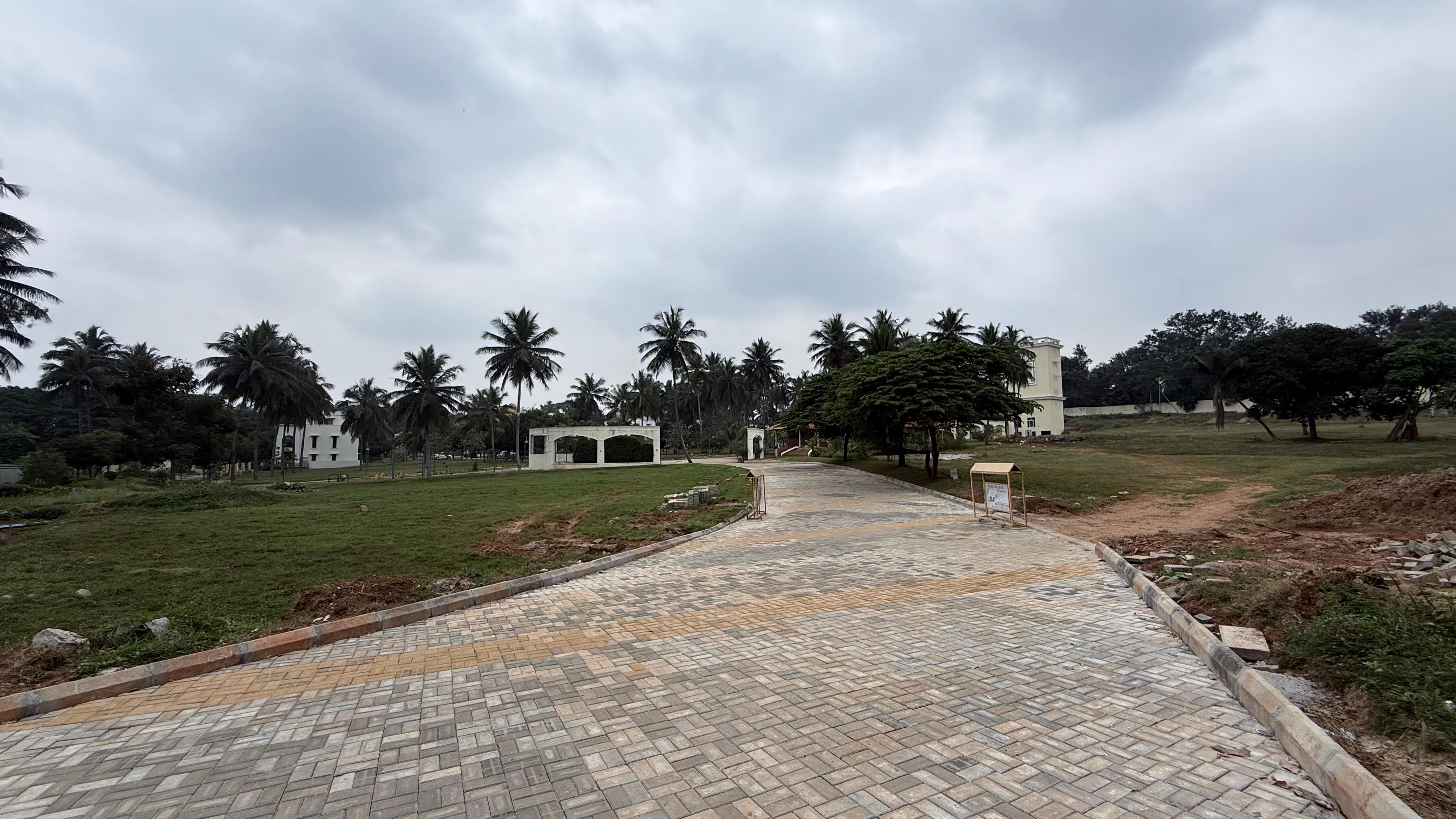 Inside road view from entrance gate to site at Sri Krishna Villa, a premium gated community by SLV Housing